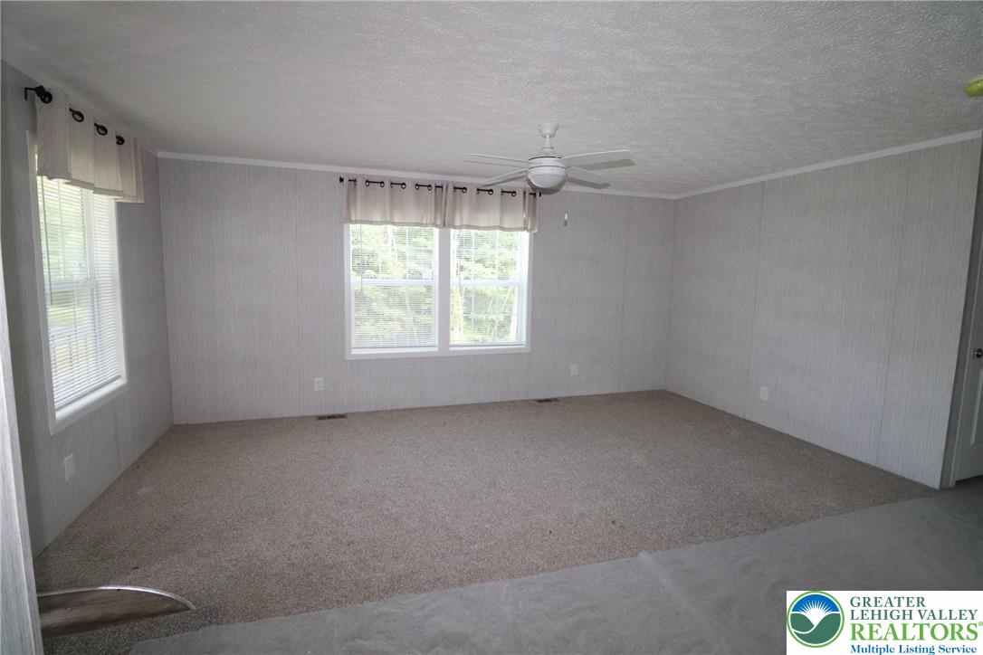 5020 Old Timber Road Stroudsburg, PA 18360 - Photo 4 of 32 an empty room with windows