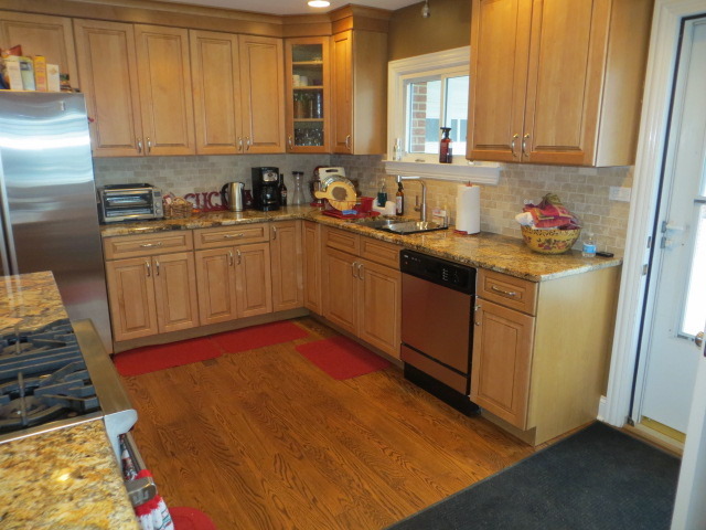 131 East Millers Road Des Plaines, IL 60016 - Photo 2 of 10 a kitchen with a sink stove and cabinets