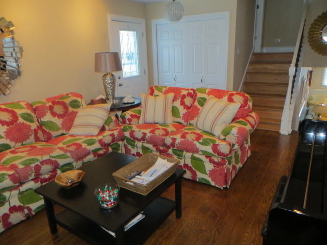 131 East Millers Road Des Plaines, IL 60016 - Photo 4 of 10 a bedroom with a bed and a dresser