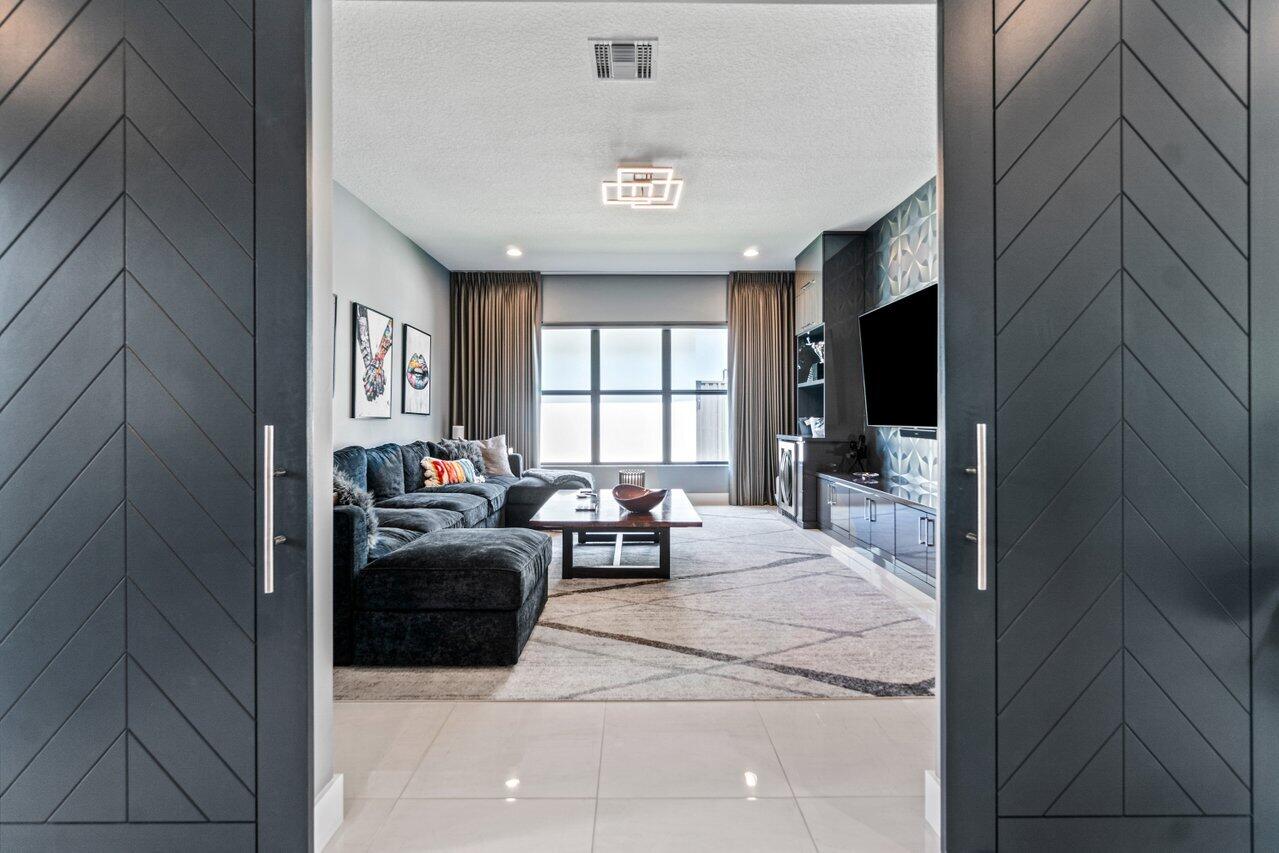 8618 Tower Bridge Court Boca Raton, FL 33496 - Photo 14 of 47 a view of living room filled with furniture and window