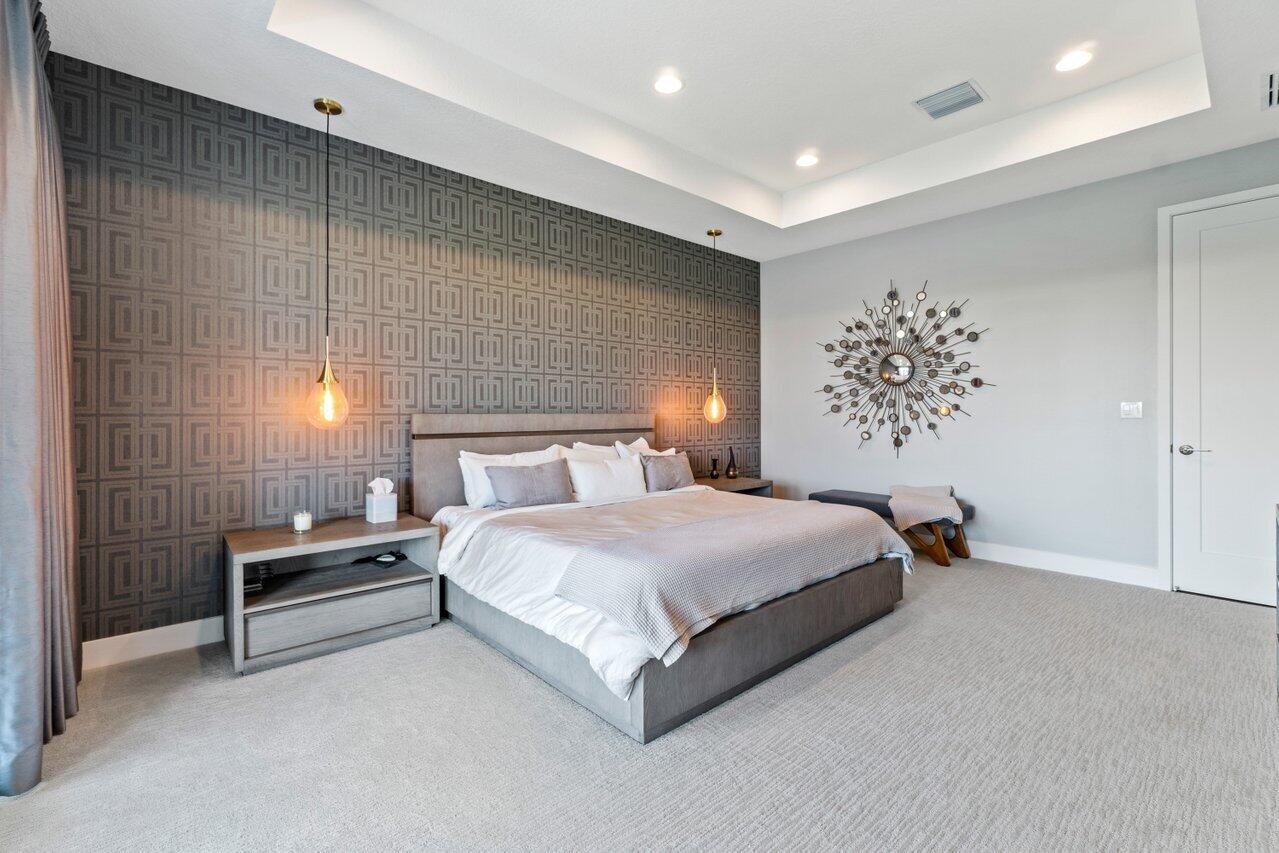 8618 Tower Bridge Court Boca Raton, FL 33496 - Photo 17 of 47 a bedroom with a bed and a window