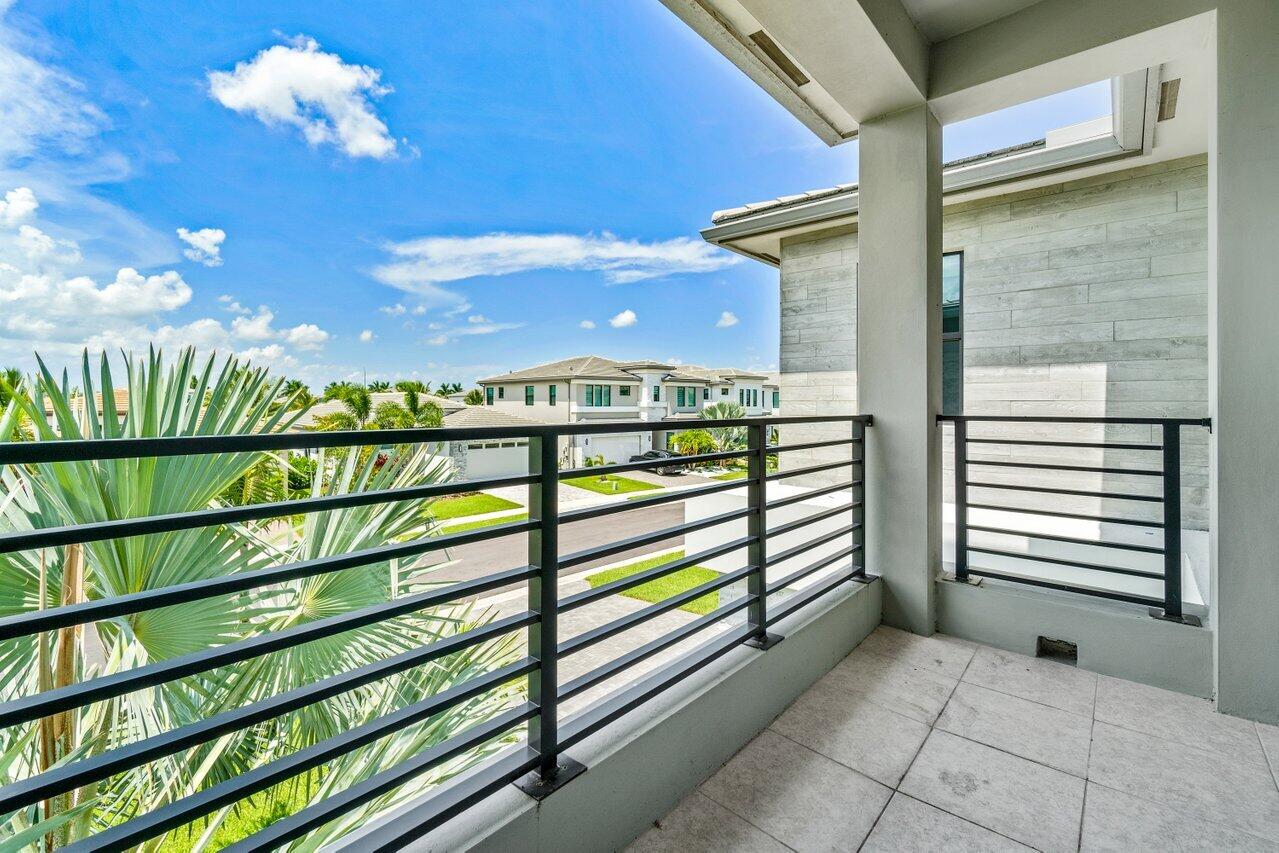 8618 Tower Bridge Court Boca Raton, FL 33496 - Photo 21 of 47 a view of a building from a balcony