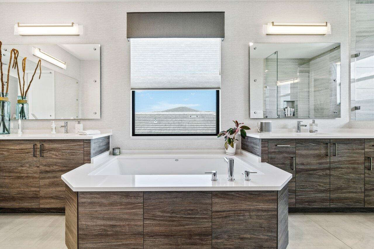 8618 Tower Bridge Court Boca Raton, FL 33496 - Photo 25 of 47 a bathroom with a sink and a bathtub