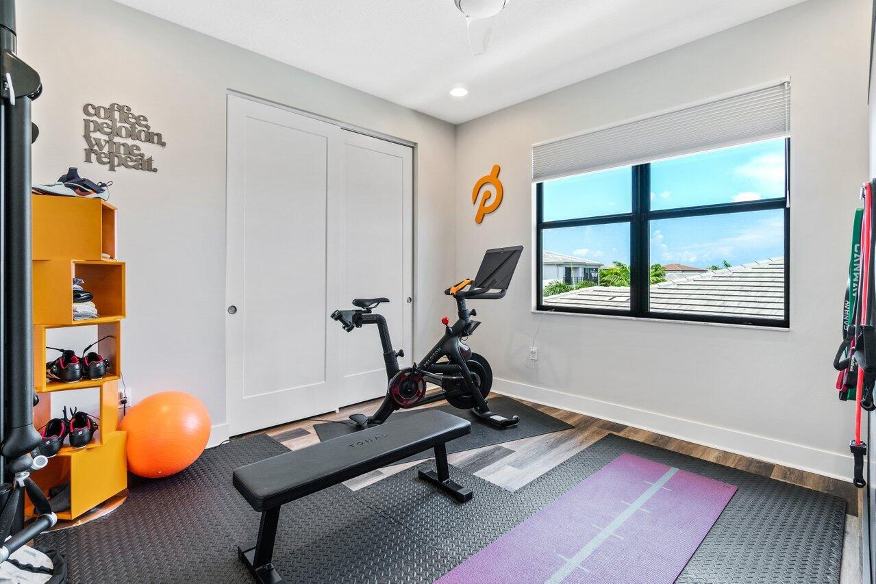 8618 Tower Bridge Court Boca Raton, FL 33496 - Photo 36 of 47 a view of a room with gym equipment