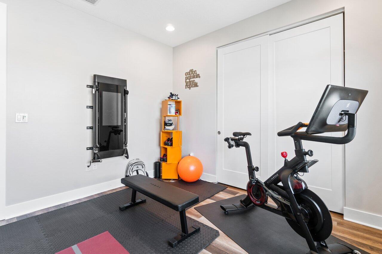 8618 Tower Bridge Court Boca Raton, FL 33496 - Photo 37 of 47 a view of a room with gym equipment