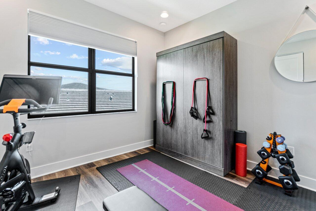 8618 Tower Bridge Court Boca Raton, FL 33496 - Photo 38 of 47 a room with gym equipment