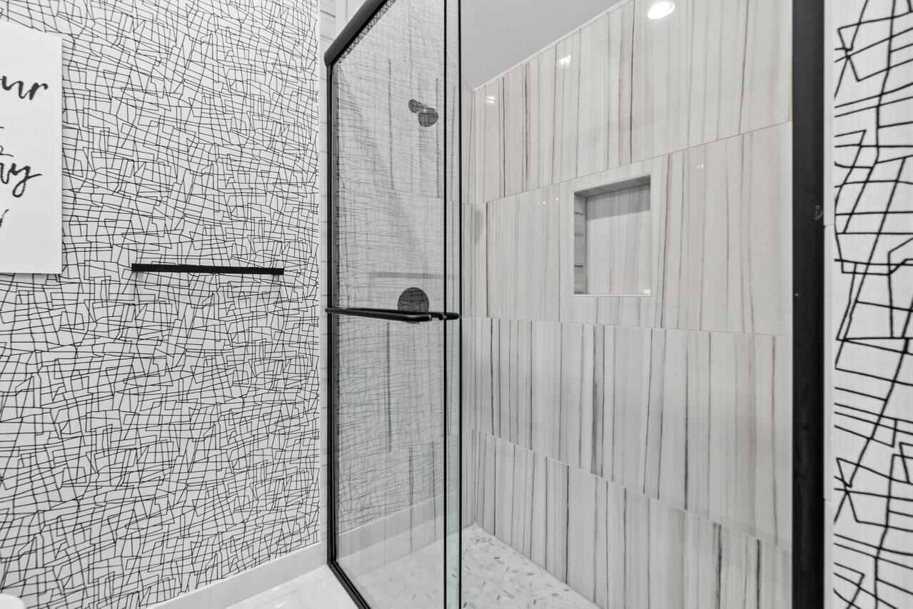 8618 Tower Bridge Court Boca Raton, FL 33496 - Photo 39 of 47 a bathroom with a shower