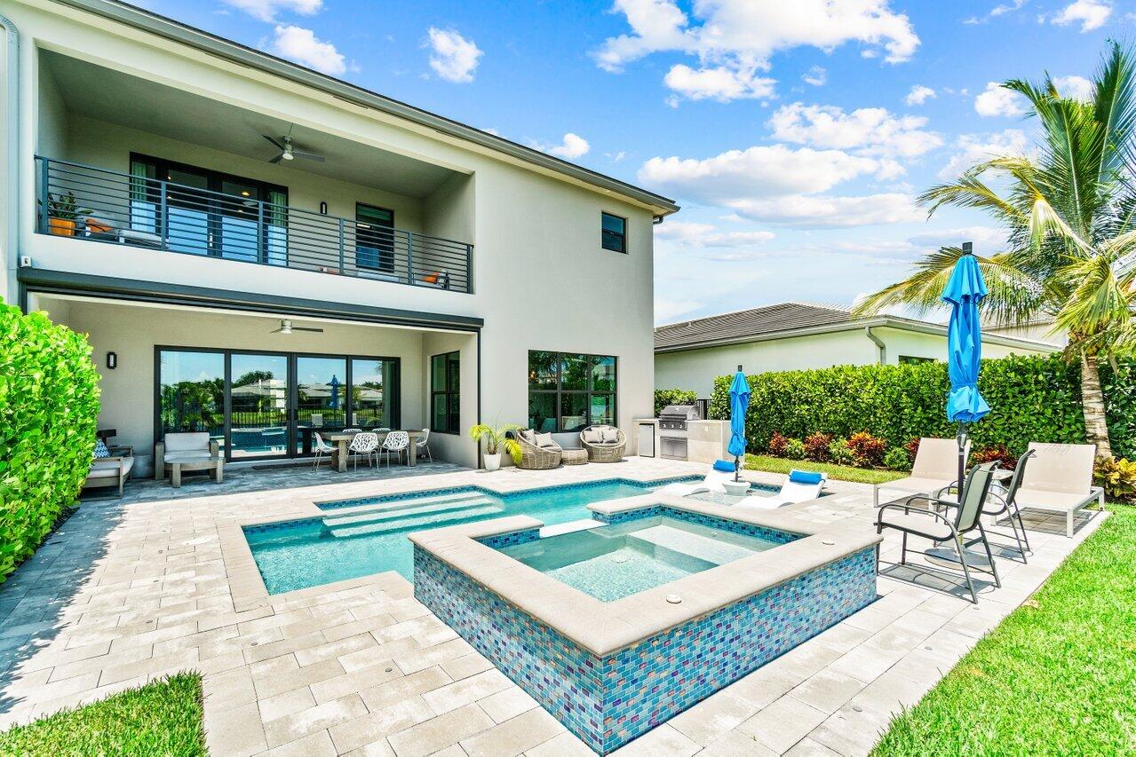 8618 Tower Bridge Court Boca Raton, FL 33496 - Photo 43 of 47 a view of a house with backyard and sitting area