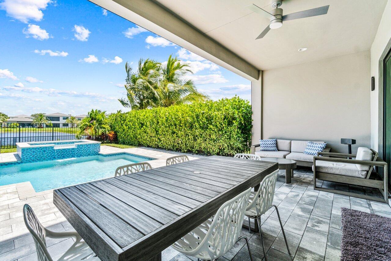 8618 Tower Bridge Court Boca Raton, FL 33496 - Photo 47 of 47 a outdoor space with chairs