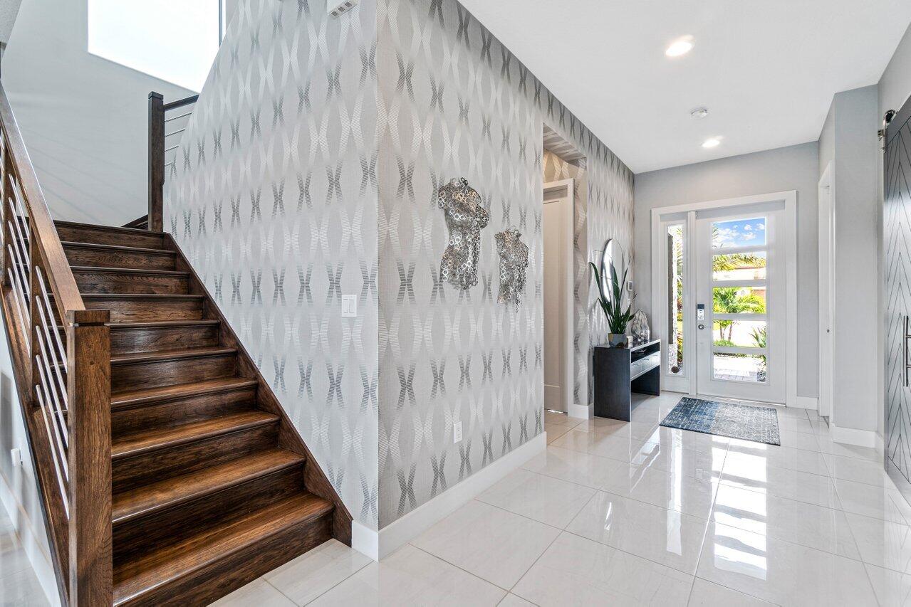 8618 Tower Bridge Court Boca Raton, FL 33496 - Photo 5 of 47 a view of a entryway with wooden floor