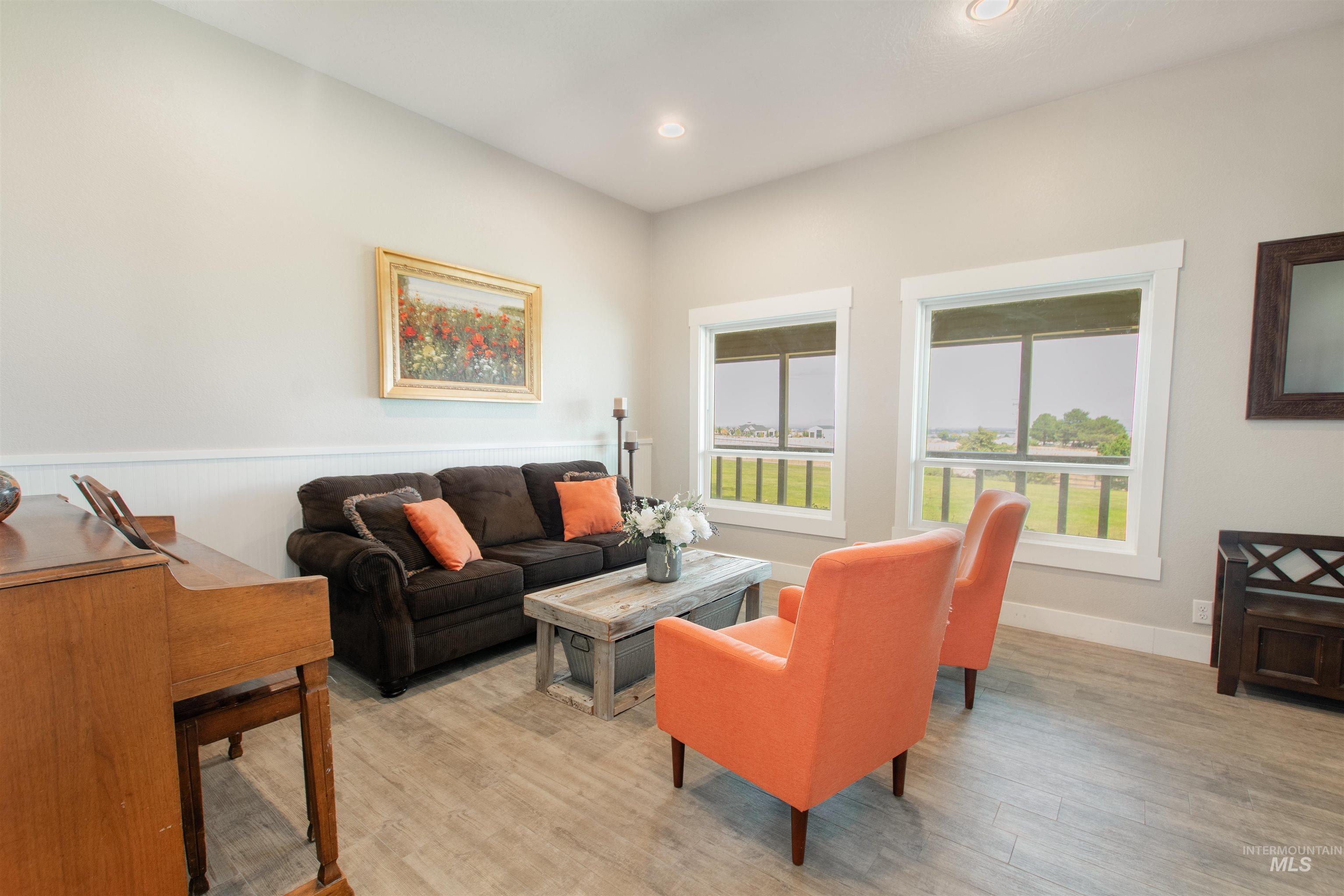 12369 Deer Flat Road Nampa, ID 83686 - Photo 25 of 50 Bedroom featuring light-toned walls, recessed lighting, and carpeting