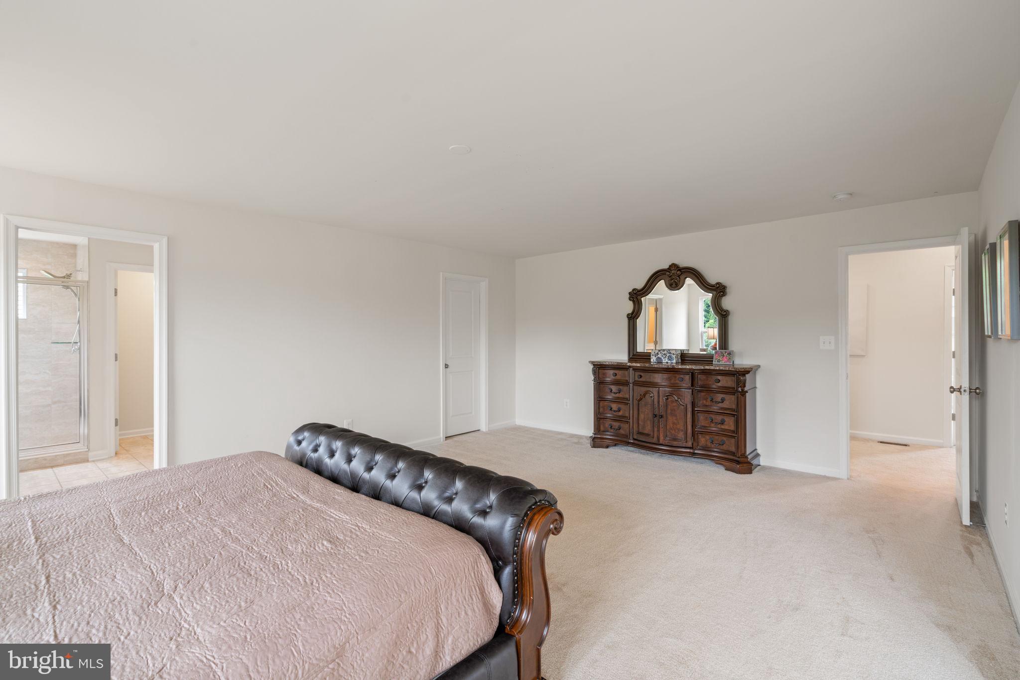8134 Skystone Loop Manassas Park, VA 20111 - Photo 21 of 33 Large primary bedroom
