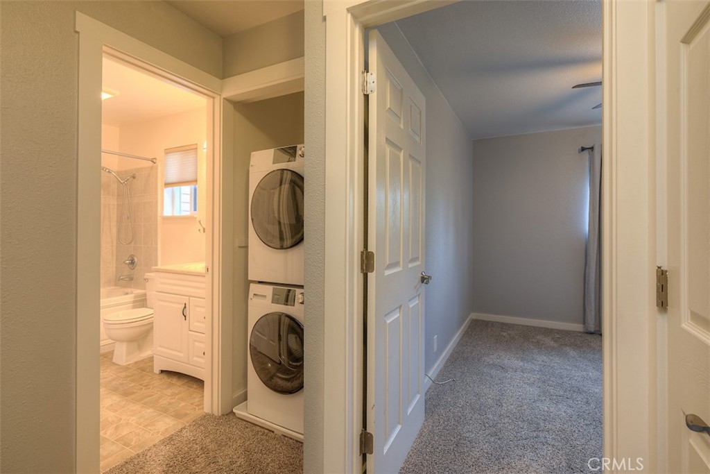 2910 Pennyroyal Drive Chico, CA 95928 - Photo 20 of 41 a view of a bedroom with washer and dryer