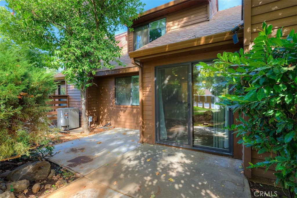 2910 Pennyroyal Drive Chico, CA 95928 - Photo 27 of 41 a view of a chair and table in backyard of the house