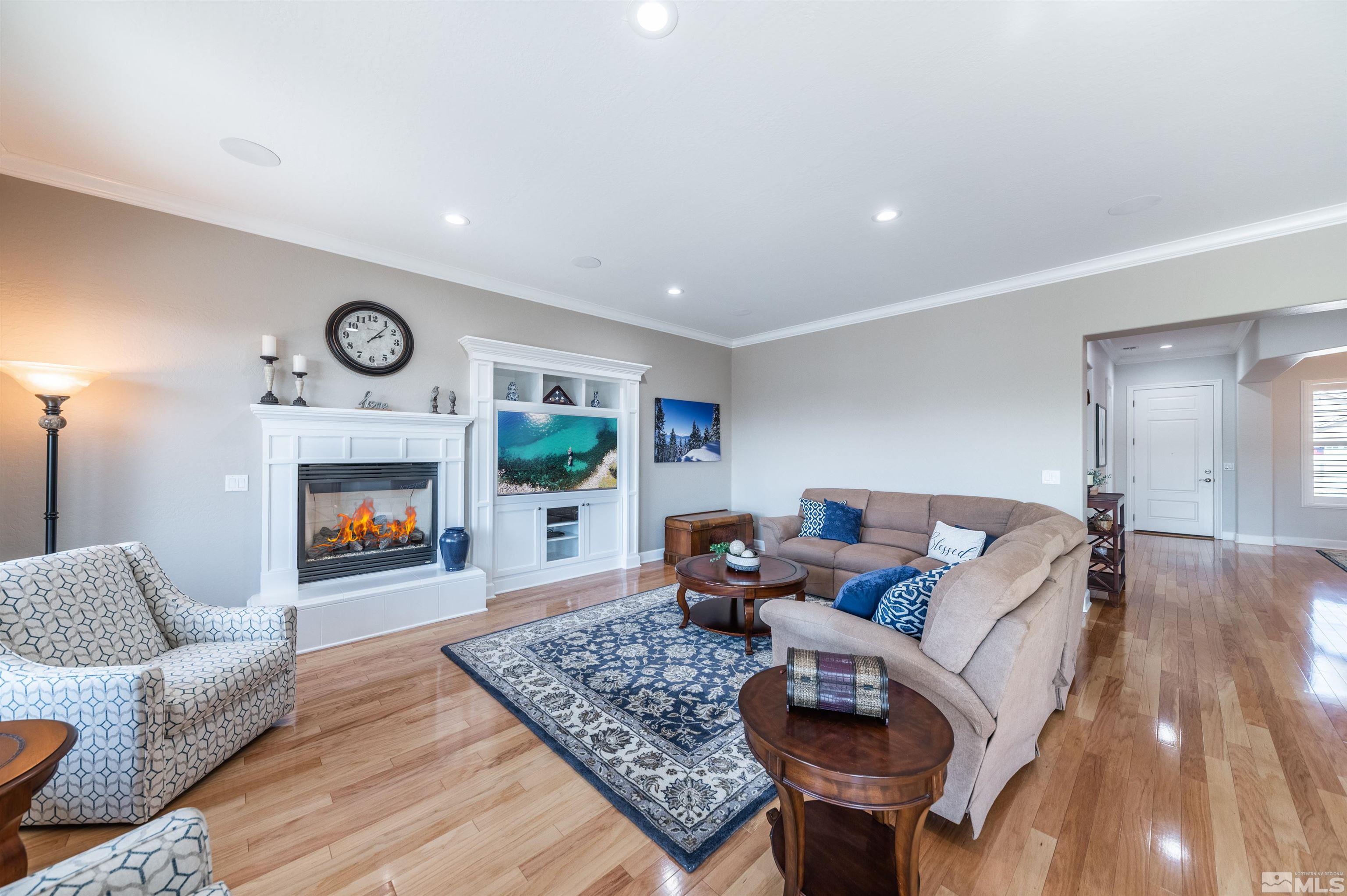 1291 Meridian Ranch Drive Reno, NV 89523 - Photo 13 of 30 a living room with furniture and a fireplace