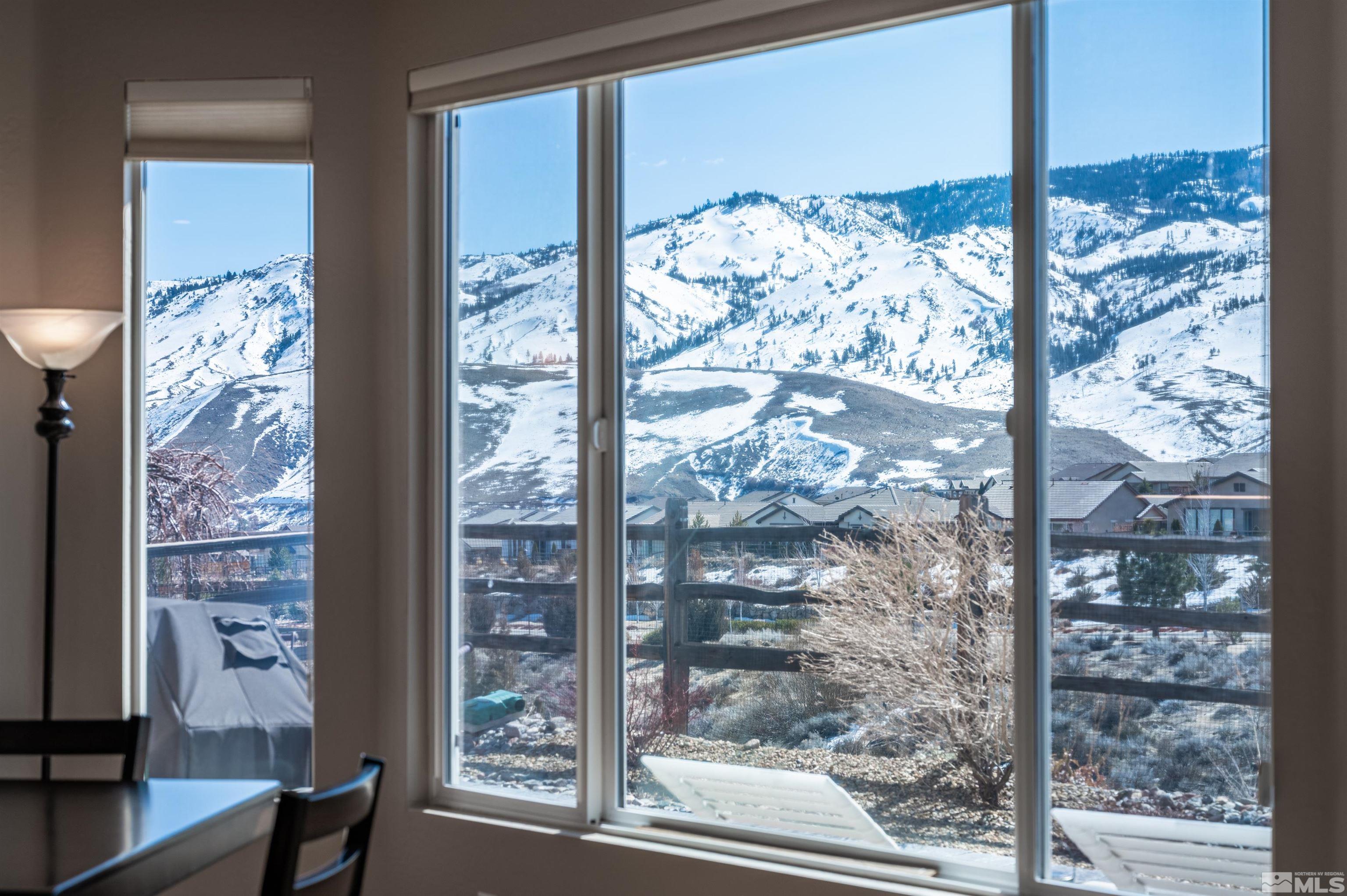 1291 Meridian Ranch Drive Reno, NV 89523 - Photo 19 of 30 a view of a glass door with a tree