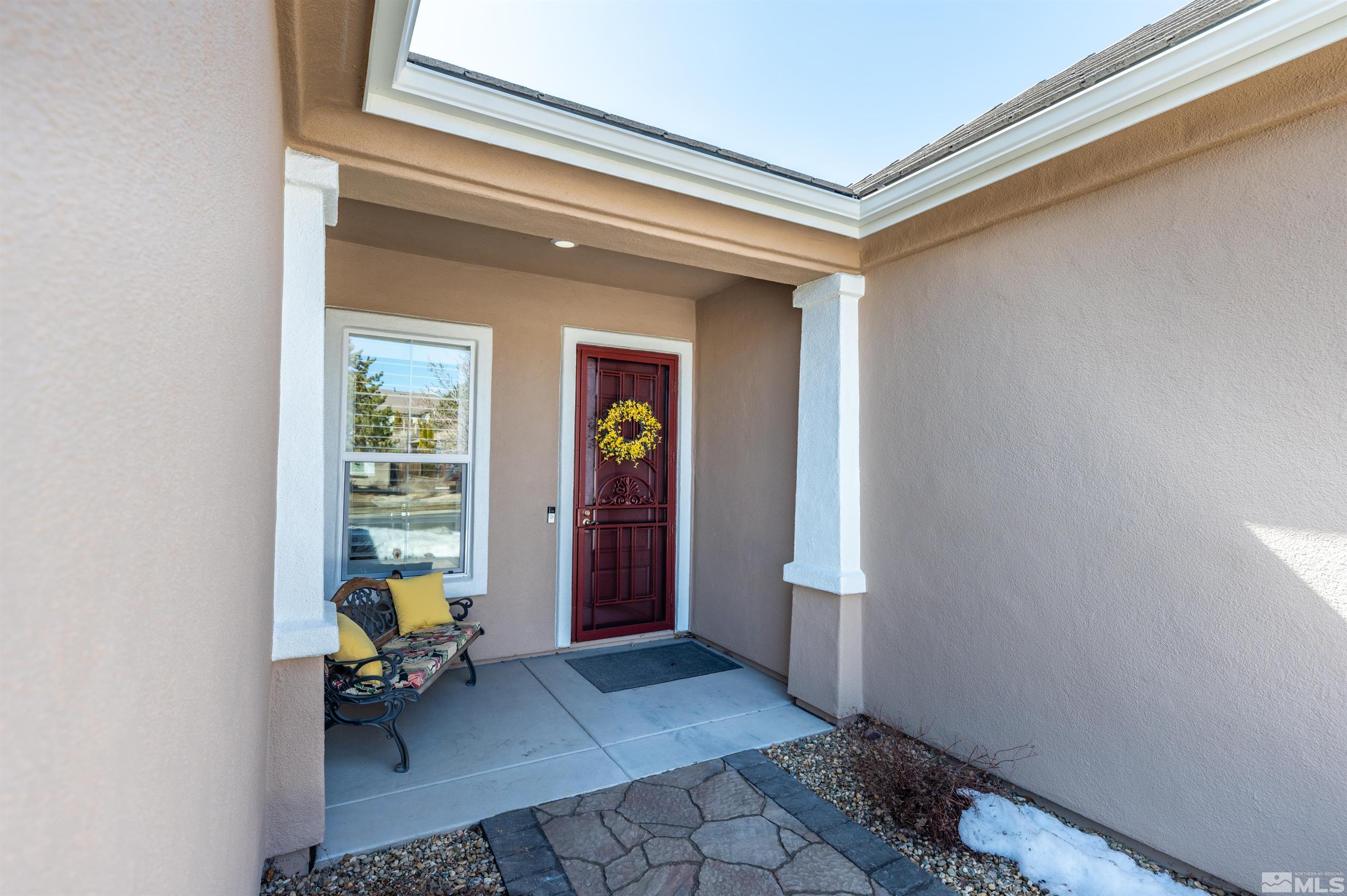 1291 Meridian Ranch Drive Reno, NV 89523 - Photo 2 of 30 a view of a livingroom with lounge chair and a window