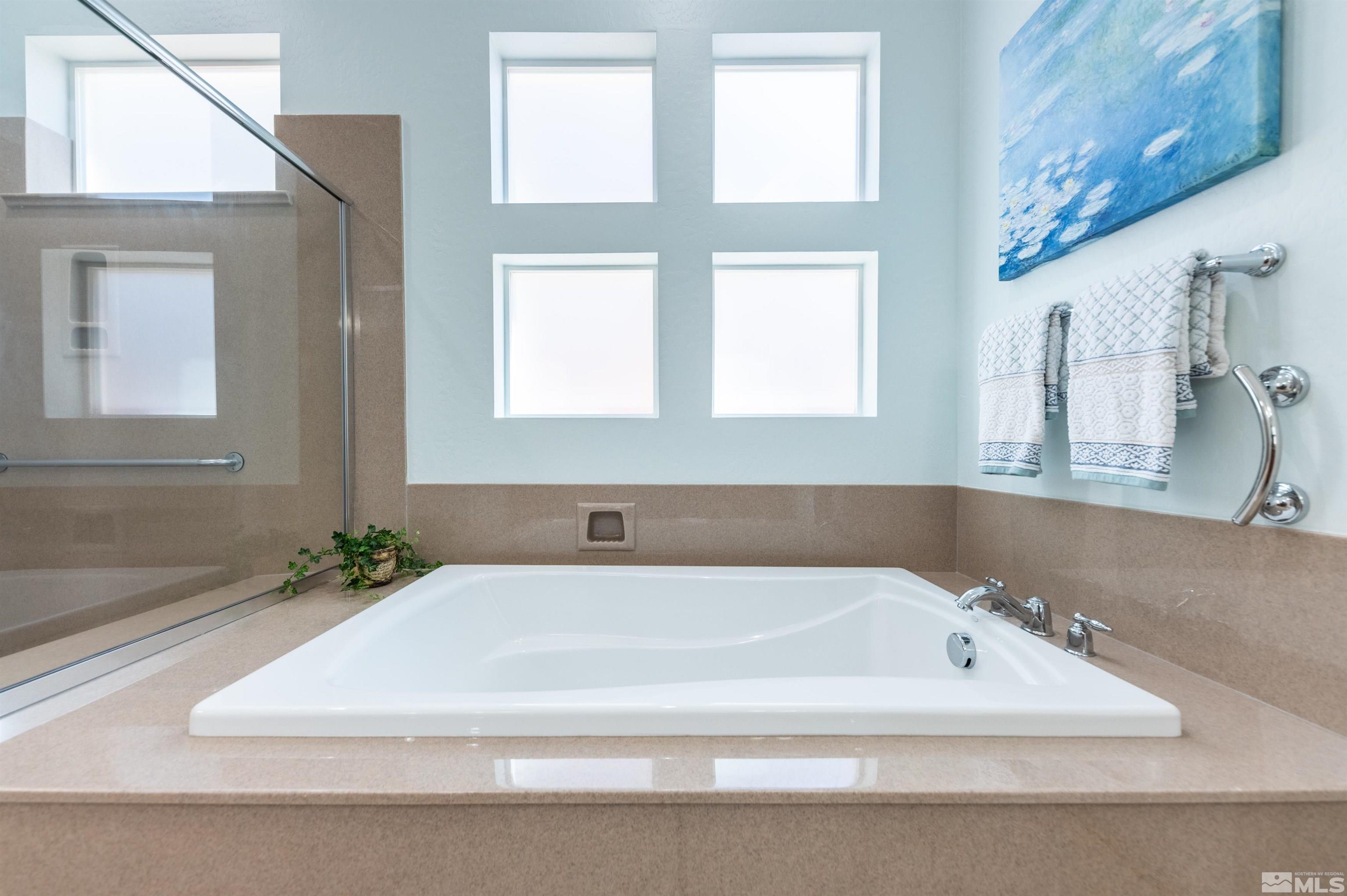 1291 Meridian Ranch Drive Reno, NV 89523 - Photo 21 of 30 a white bath tub sitting next to a window