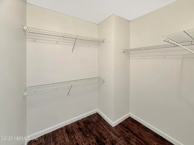 a view of small space with racks on the wall