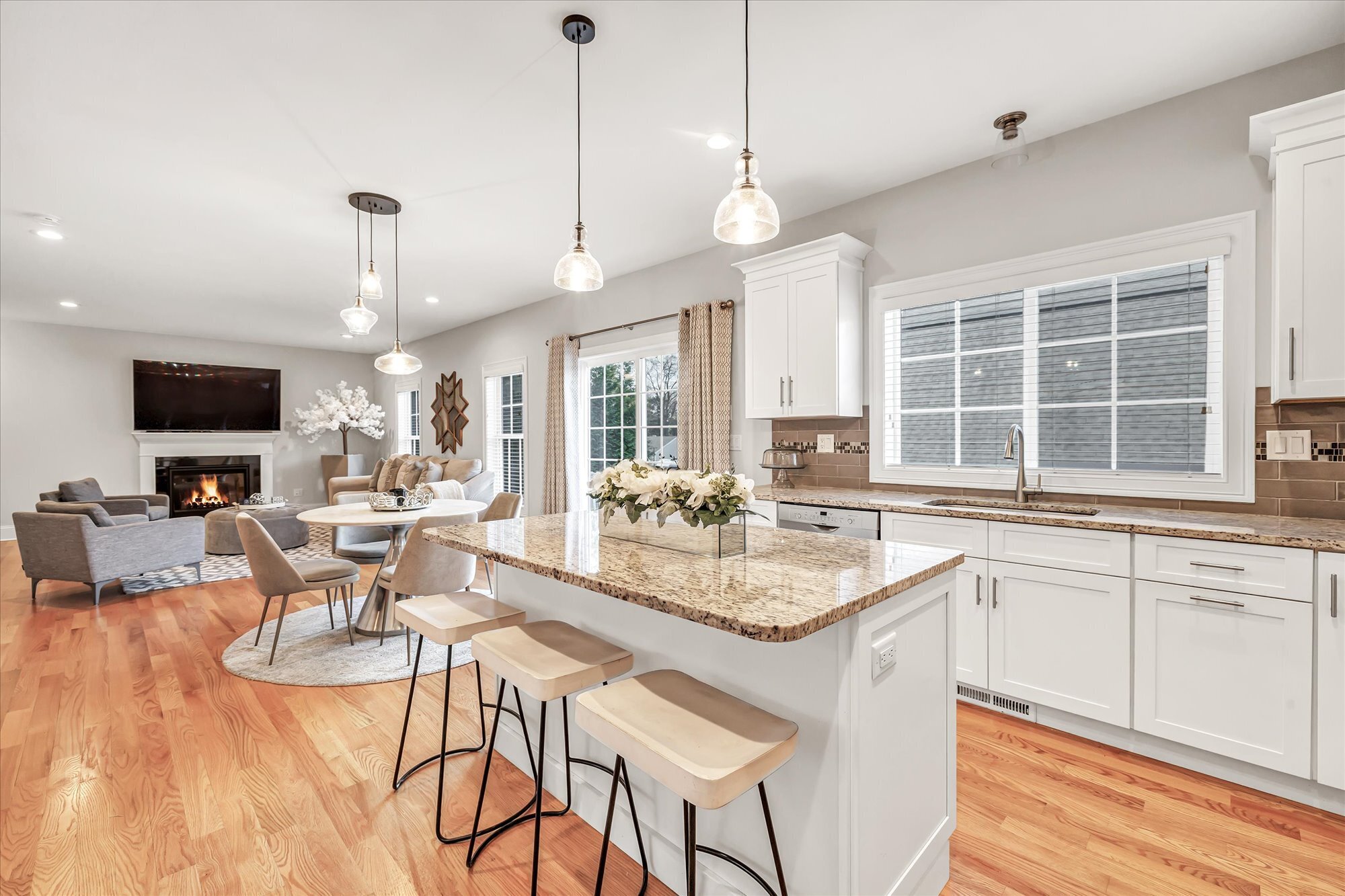 191 Meadow Street Shelton, CT 06484 - Photo 11 of 40 a large kitchen with a table and chairs