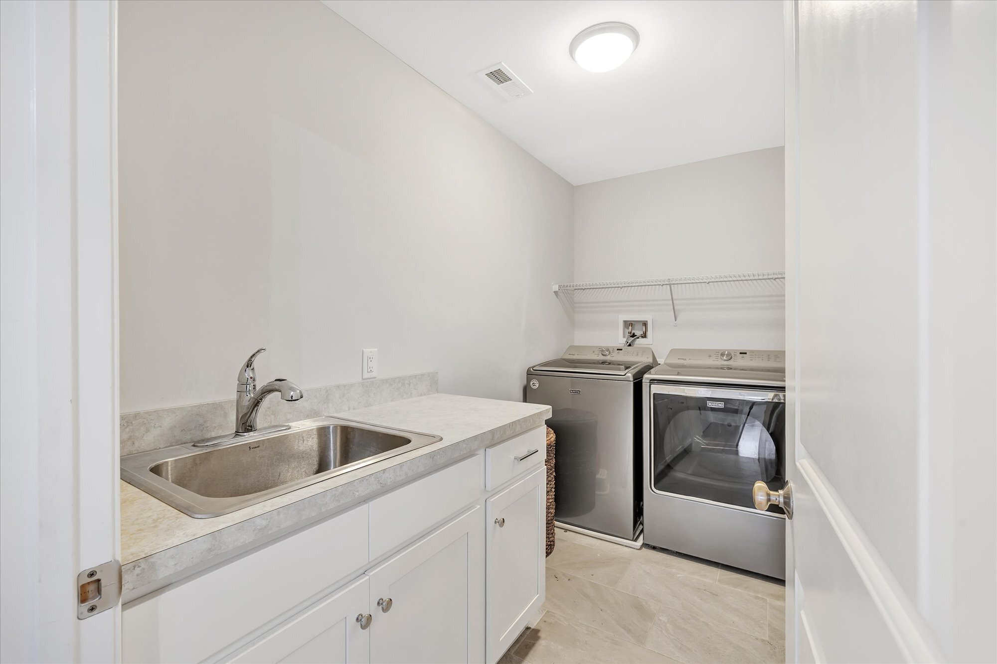191 Meadow Street Shelton, CT 06484 - Photo 16 of 40 a utility room with sink dryer and washer