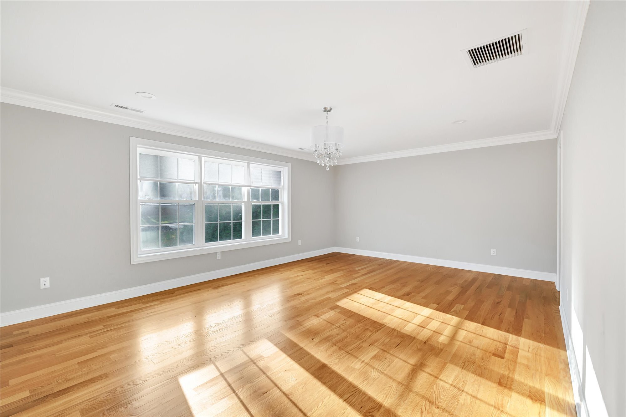191 Meadow Street Shelton, CT 06484 - Photo 17 of 40 a view of an empty room with a window