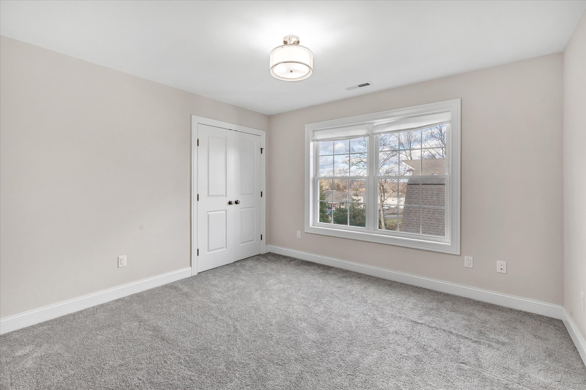 191 Meadow Street Shelton, CT 06484 - Photo 23 of 40 a view of an empty room with a window