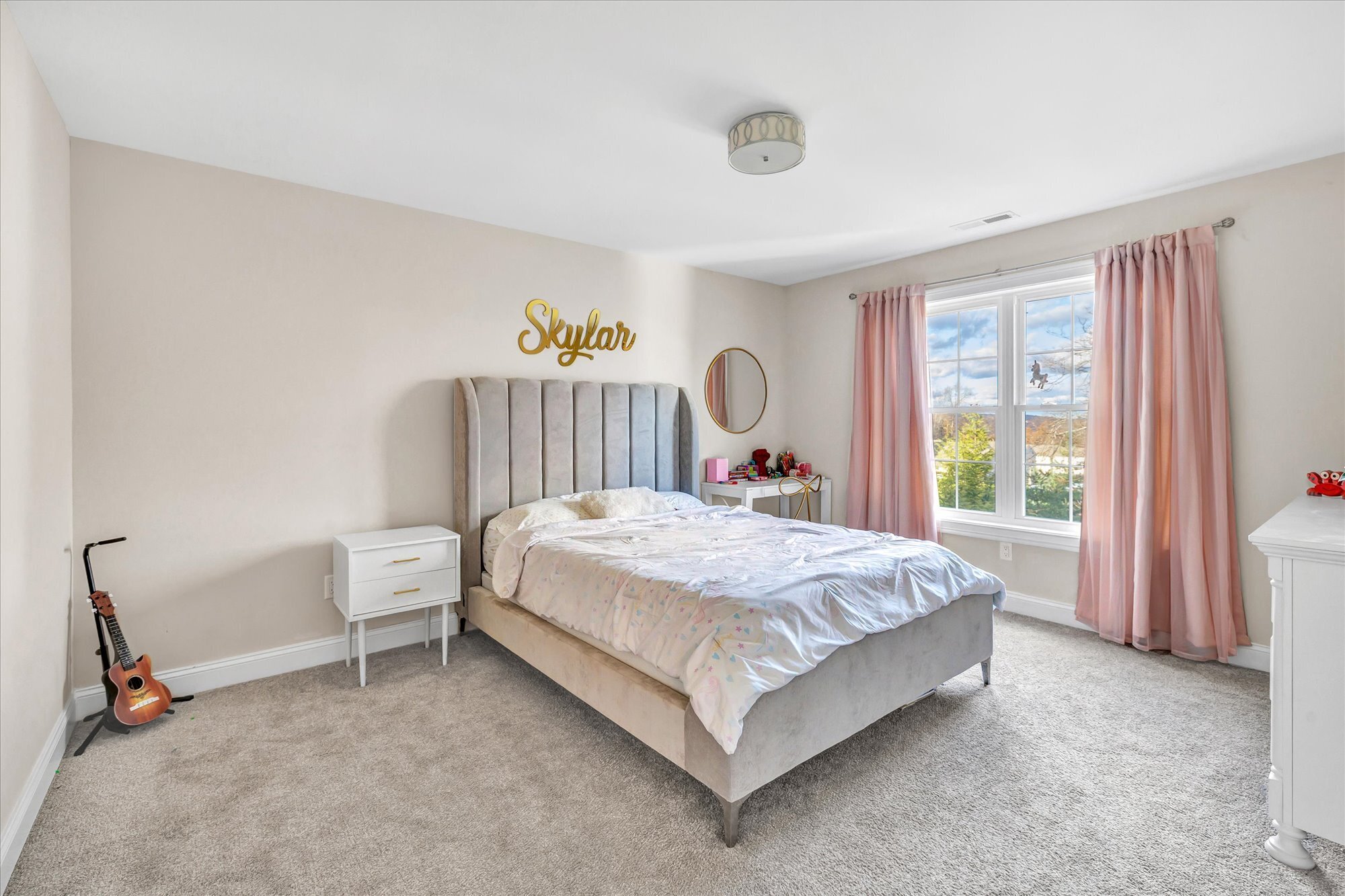 191 Meadow Street Shelton, CT 06484 - Photo 24 of 40 a bed sitting in a spacious bedroom next to a window