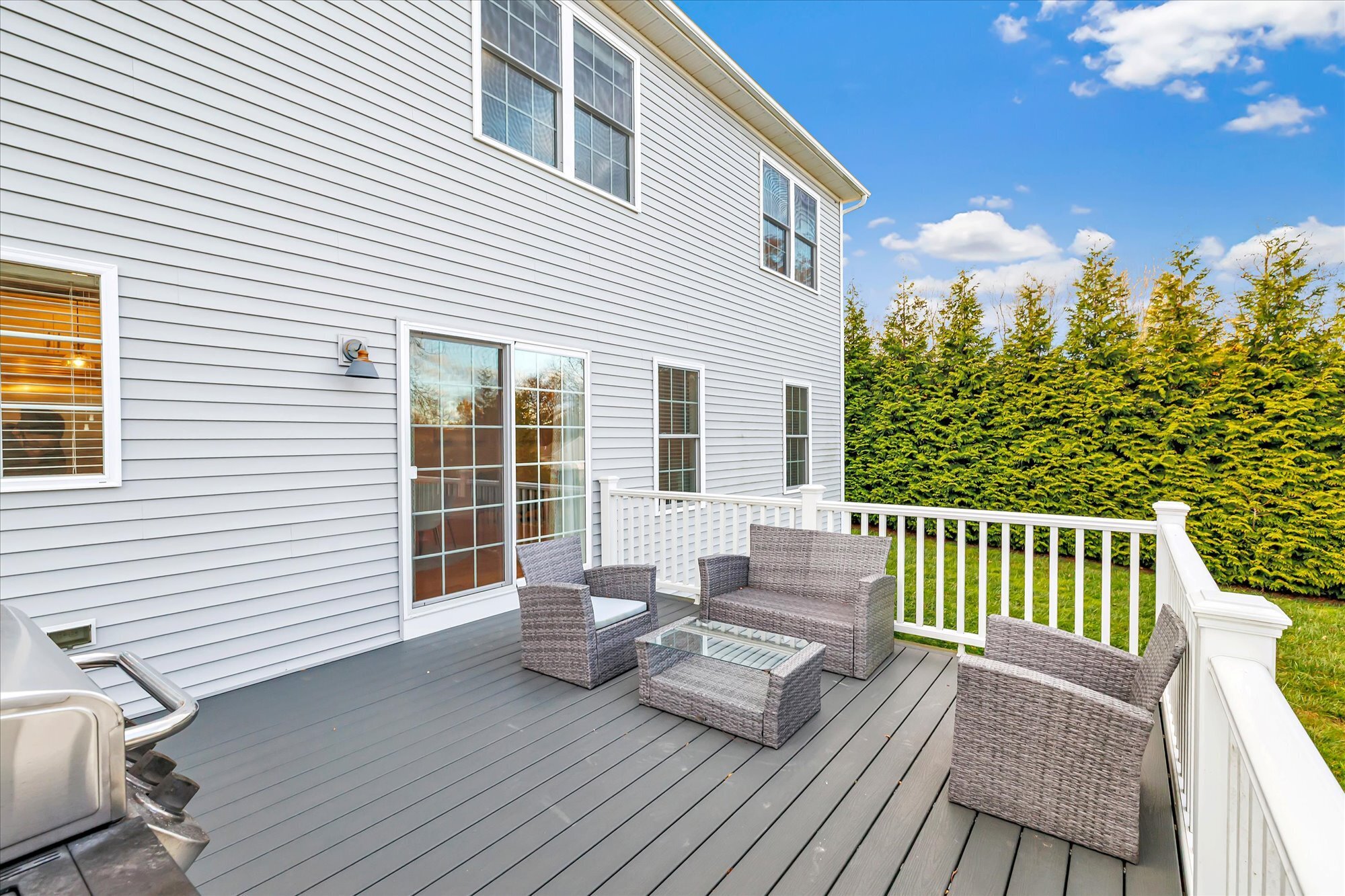 191 Meadow Street Shelton, CT 06484 - Photo 31 of 40 a view of a chair and tables in the balcony