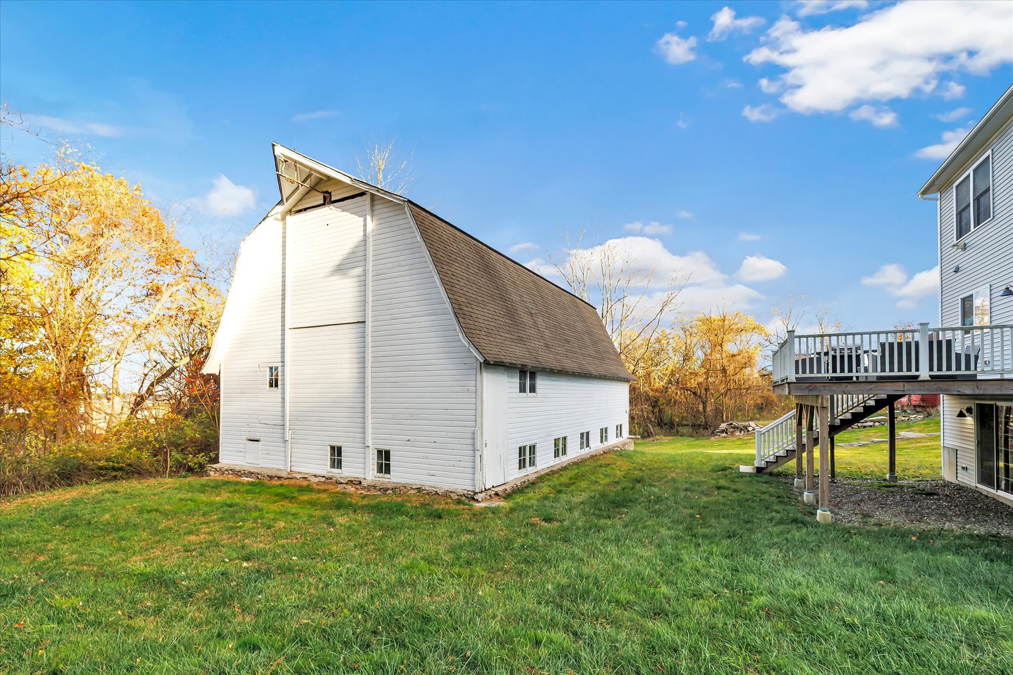 191 Meadow Street Shelton, CT 06484 - Photo 36 of 40 a view of a house with a yard and a fence