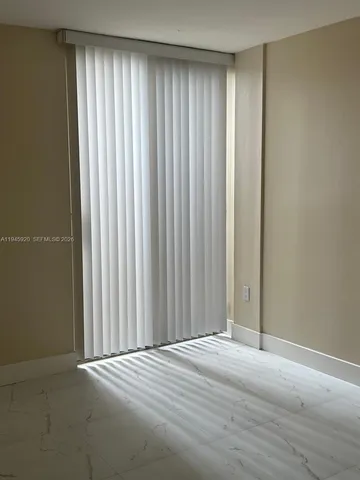 a view of wooden floor and closet