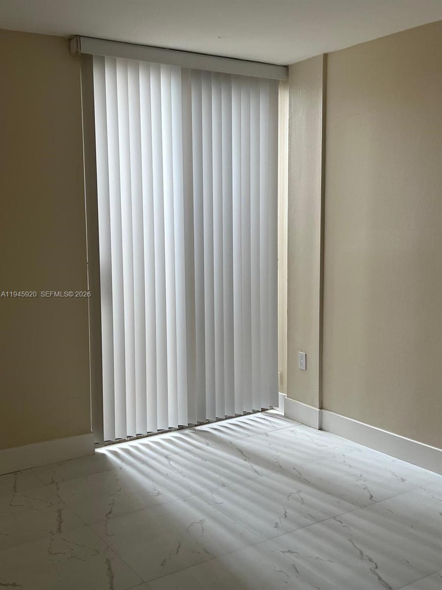 10801 Southwest 109th Court, Unit D110 Miami, FL 33176 - Photo 13 of 25 a view of wooden floor and closet