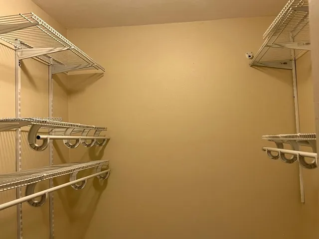 a close up of a wall with rack on the wall