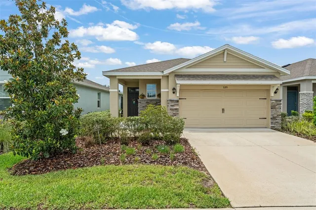 front view of house with a yard