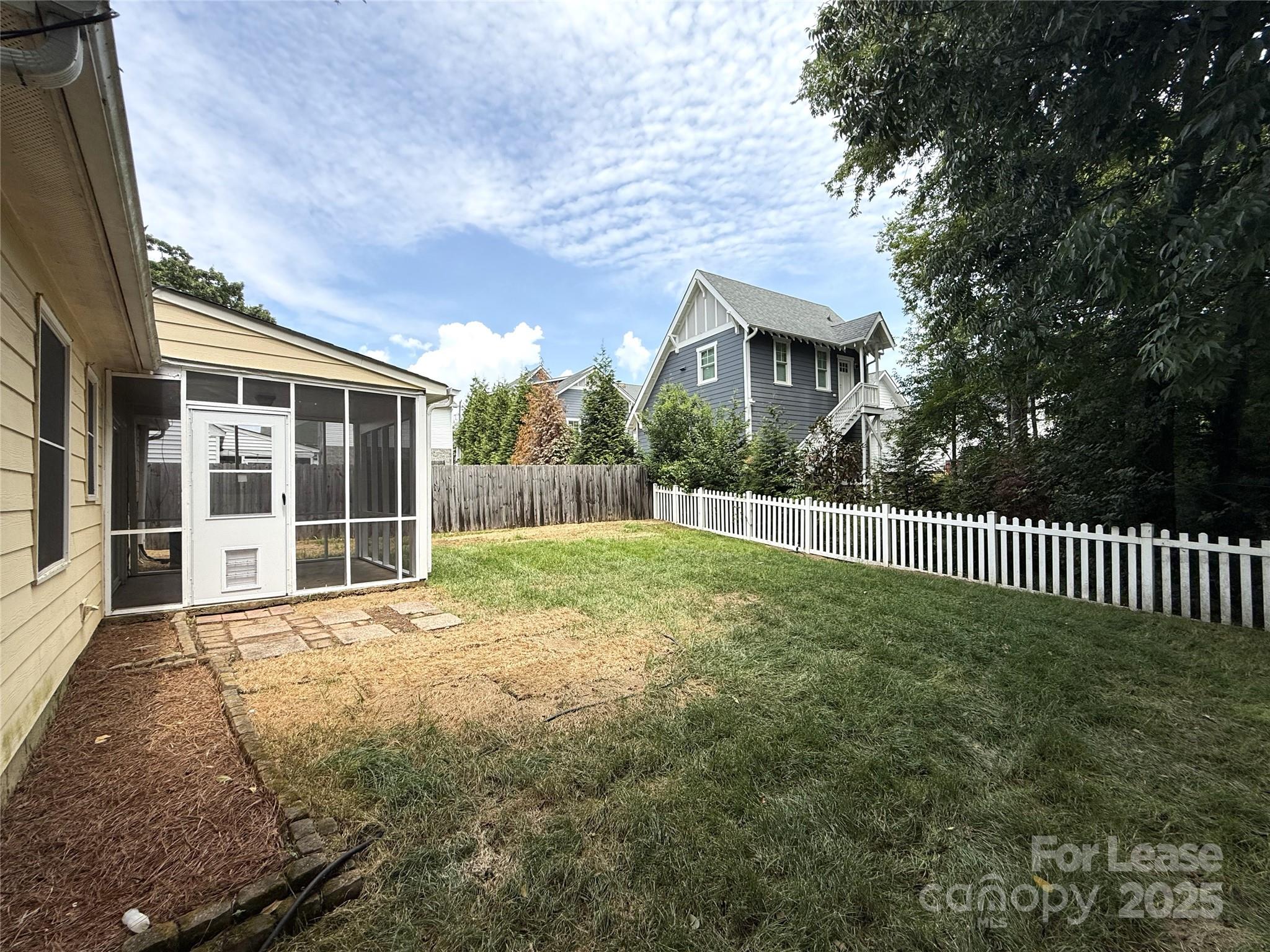 420 Beaty Street Davidson, NC 28036 - Photo 14 of 15 a view of a garden with a house