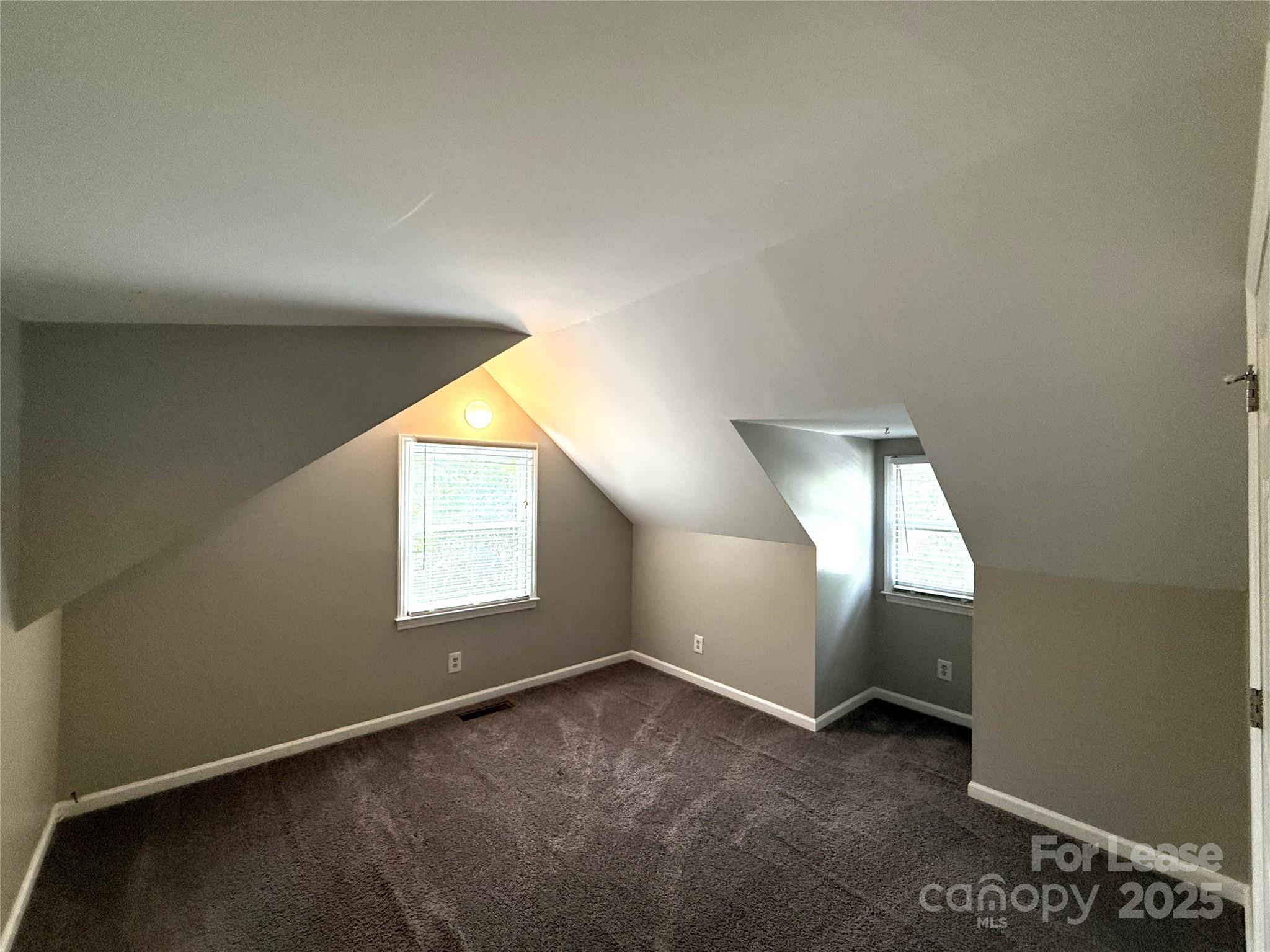 420 Beaty Street Davidson, NC 28036 - Photo 9 of 15 an empty room with windows