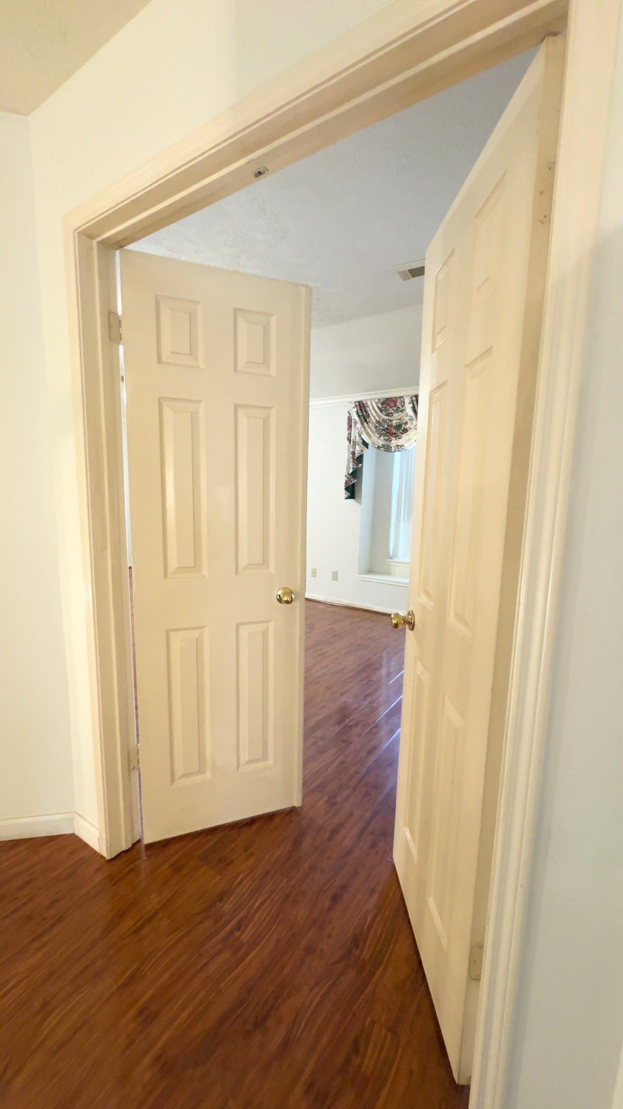 14731 Ridgechase Lane Houston, TX 77014 - Photo 21 of 37 a view of a hallway with wooden floor