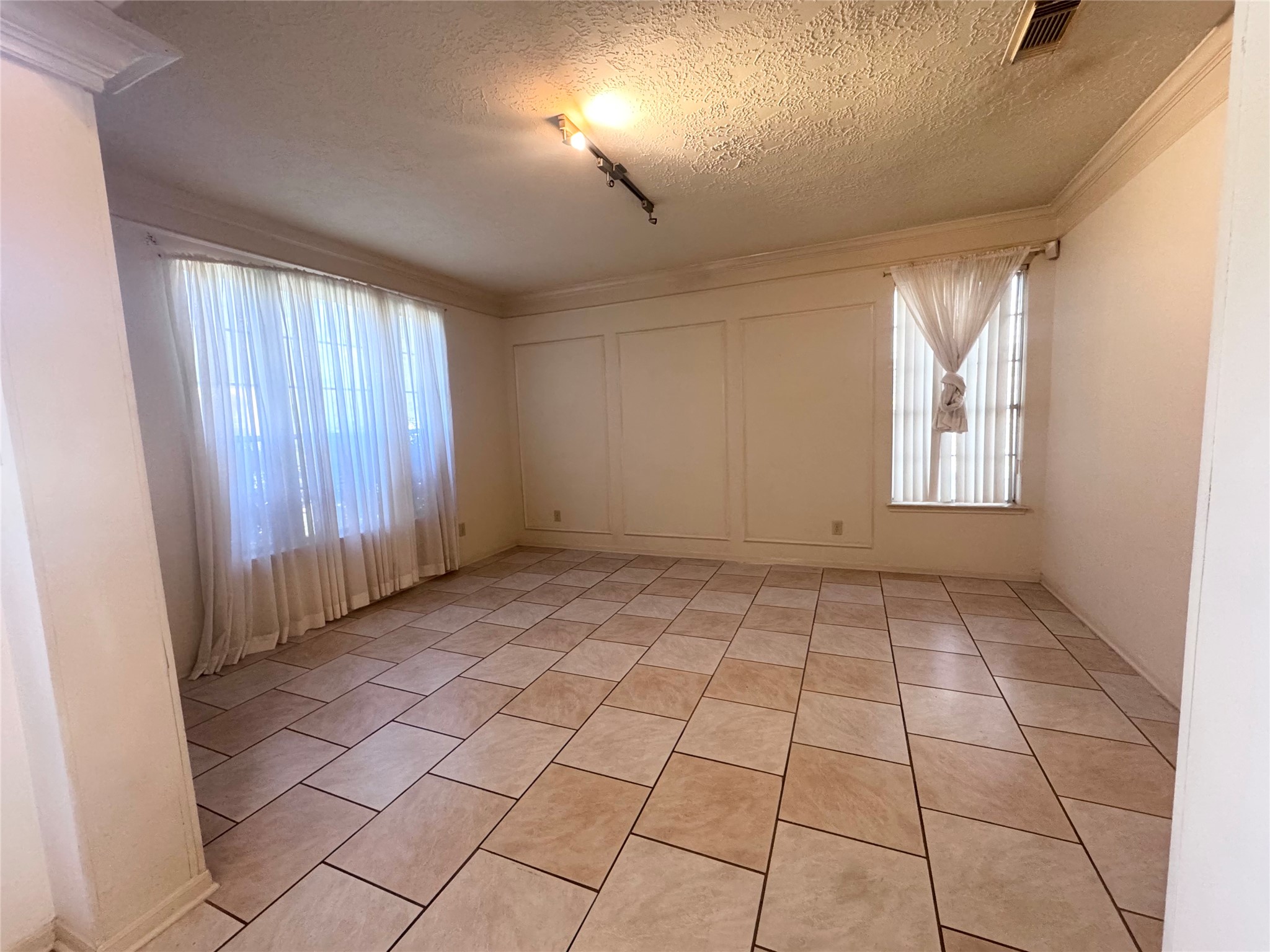 14731 Ridgechase Lane Houston, TX 77014 - Photo 6 of 37 an empty room with windows