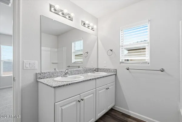 a bathroom with a sink and a bathtub