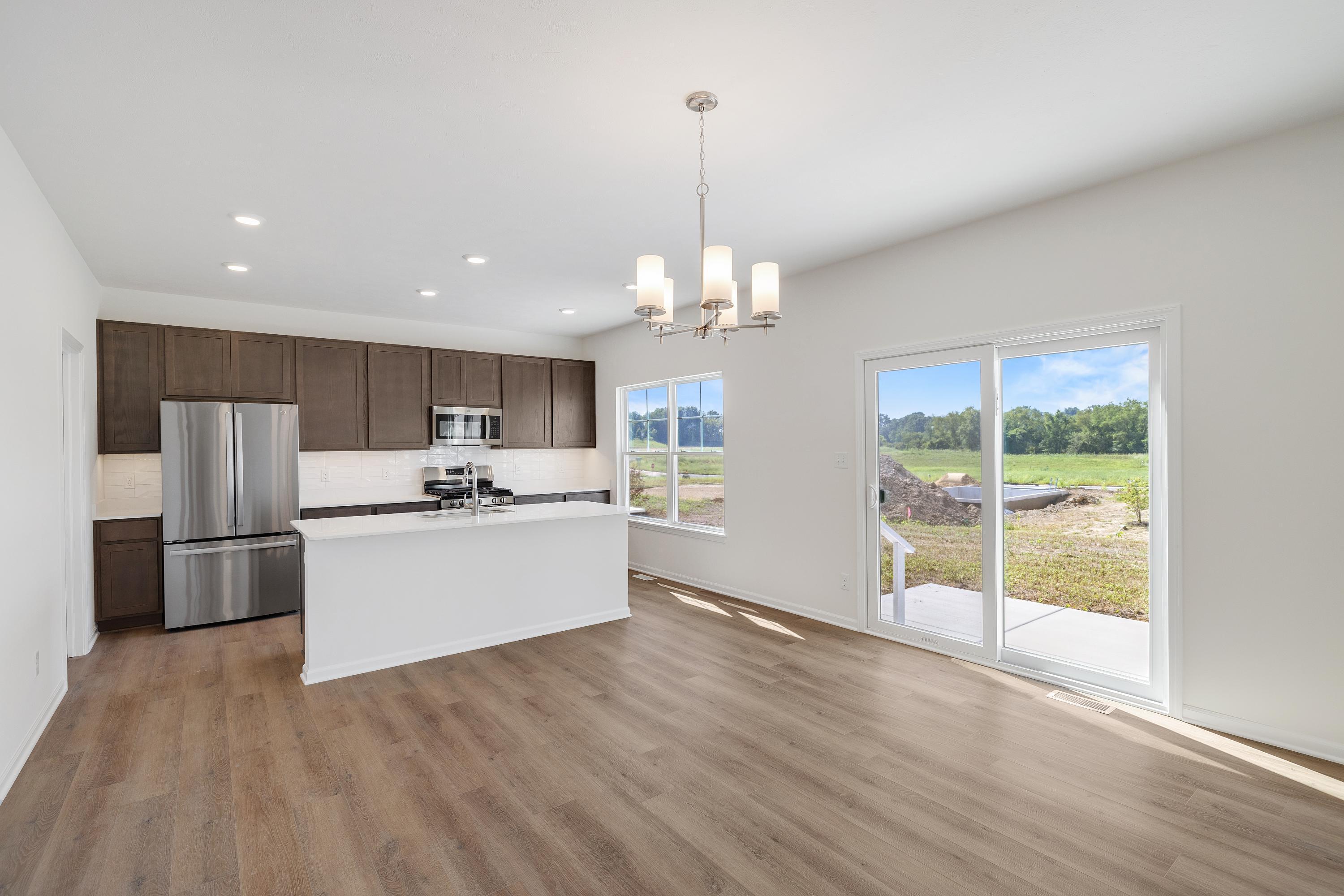 3755 Lookout Road Valparaiso, IN 46385 - Photo 5 of 21 a large kitchen with a large window and stainless steel appliances