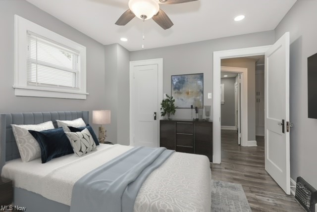 3787 Highland Road Cleveland, OH 44111 - Photo 18 of 26 Bedroom featuring ceiling fan and dark wood-type flooring