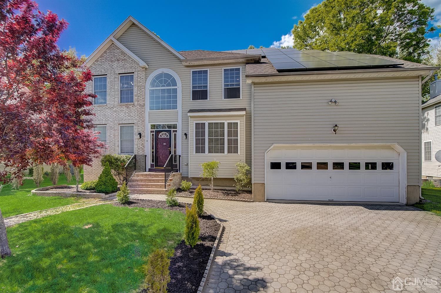 13 Revere Road Monmouth Junction, NJ 08852 - Photo 2 of 39 a front view of a house with a yard