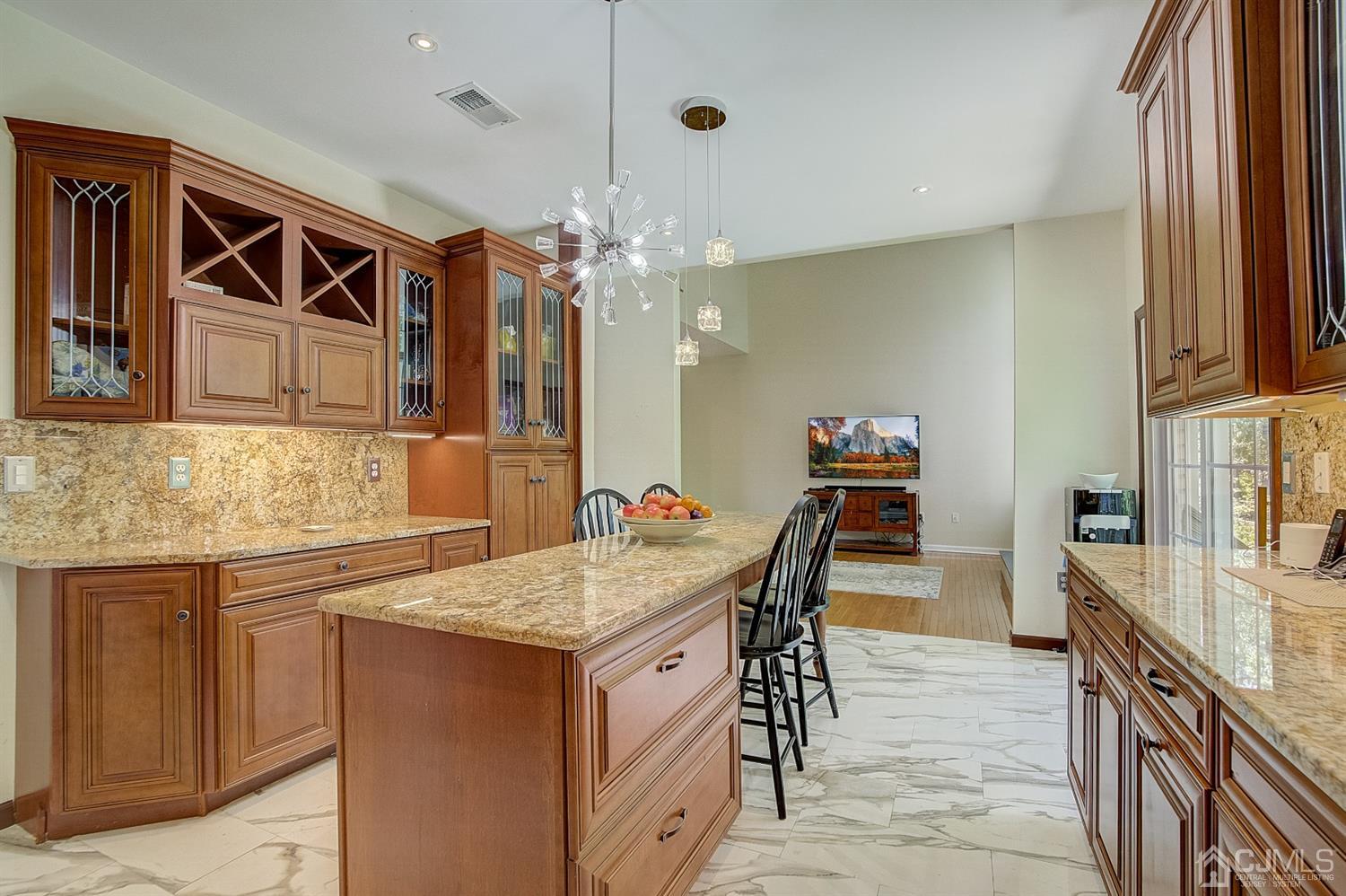 13 Revere Road Monmouth Junction, NJ 08852 - Photo 13 of 39 a kitchen that has a table and chairs in it
