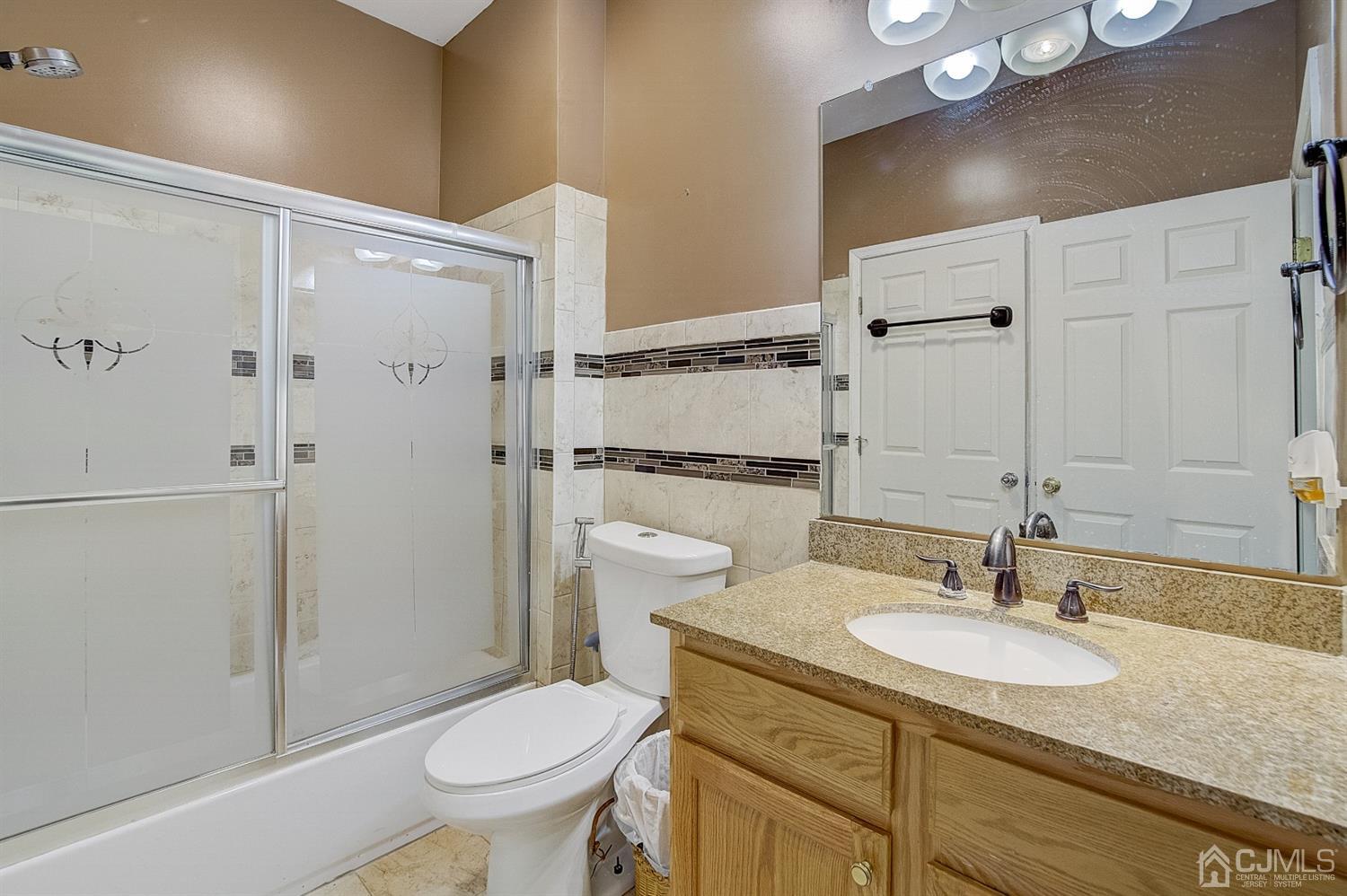 13 Revere Road Monmouth Junction, NJ 08852 - Photo 16 of 39 a bathroom with a sink toilet and shower