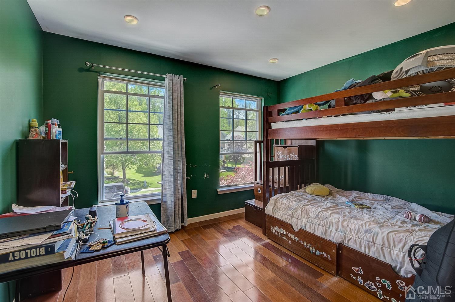 13 Revere Road Monmouth Junction, NJ 08852 - Photo 22 of 39 a bedroom with a bed and a flat screen tv