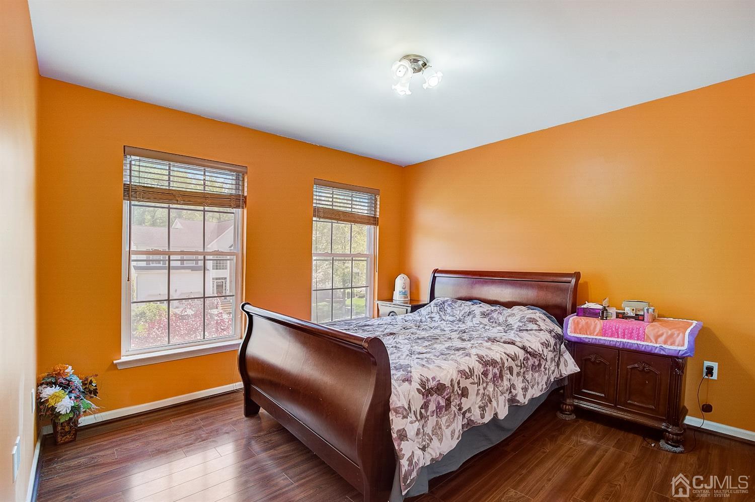 13 Revere Road Monmouth Junction, NJ 08852 - Photo 26 of 39 a bedroom with a bed and wooden floor
