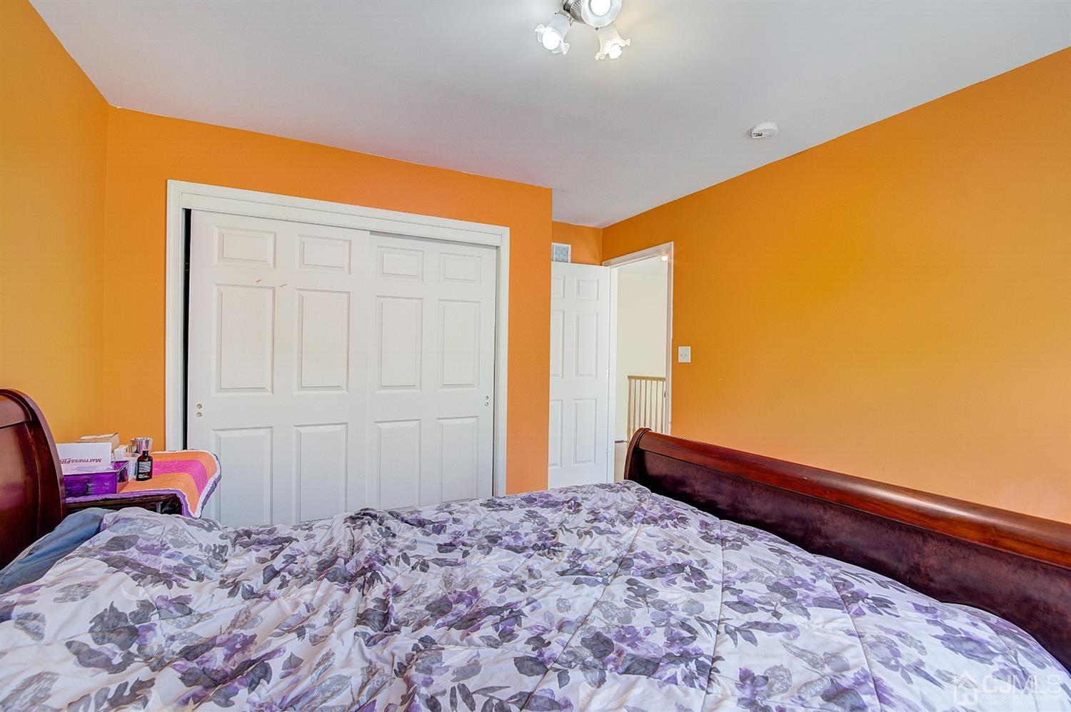 13 Revere Road Monmouth Junction, NJ 08852 - Photo 27 of 39 a bedroom with a bed and a dresser