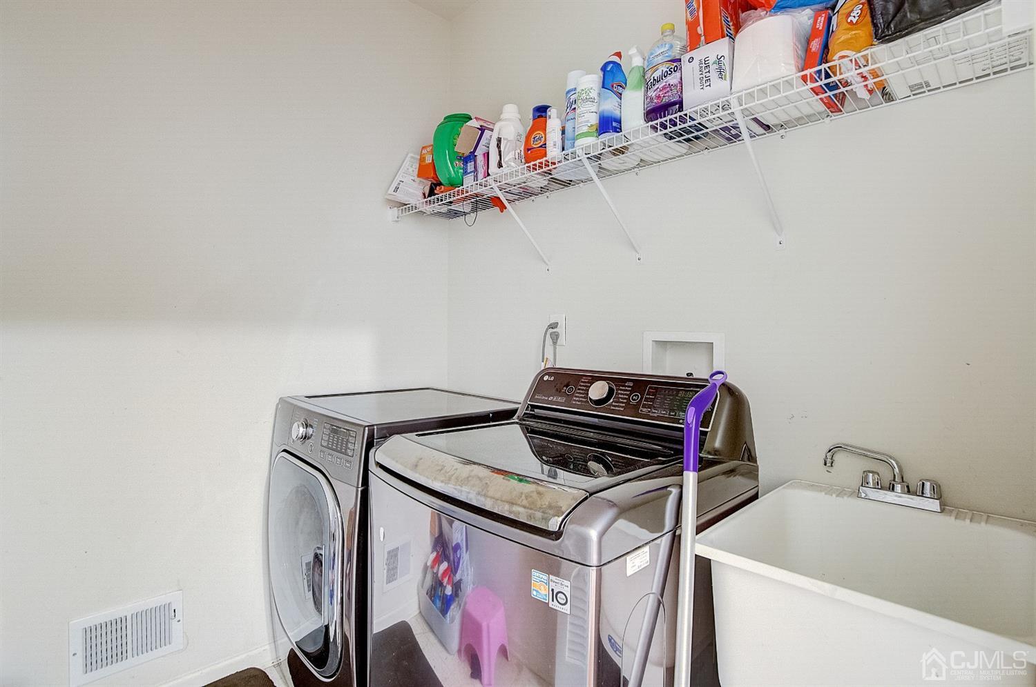 13 Revere Road Monmouth Junction, NJ 08852 - Photo 30 of 39 a utility room with dryer and washer