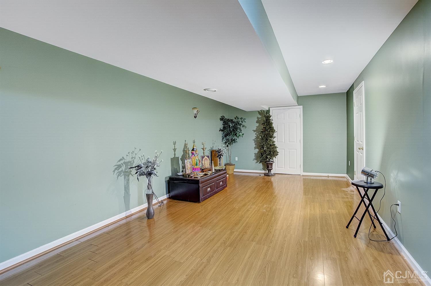 13 Revere Road Monmouth Junction, NJ 08852 - Photo 31 of 39 a view of livingroom with furniture and wooden floor