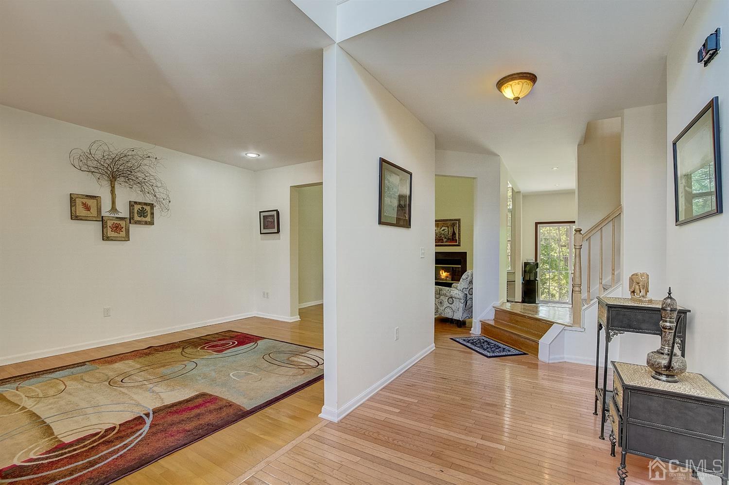 13 Revere Road Monmouth Junction, NJ 08852 - Photo 5 of 39 a bedroom with a bed and wooden floor